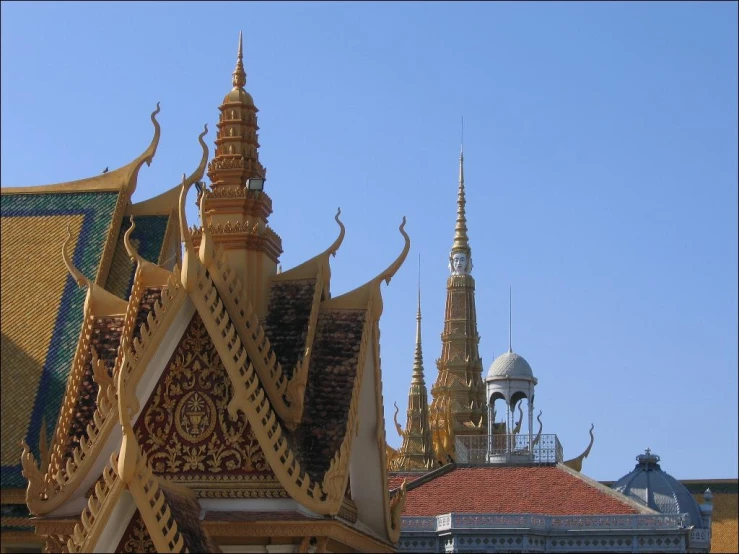 a building with some gold domes on top