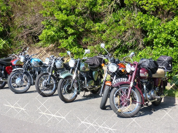 there is many different motorcycles that are parked near each other