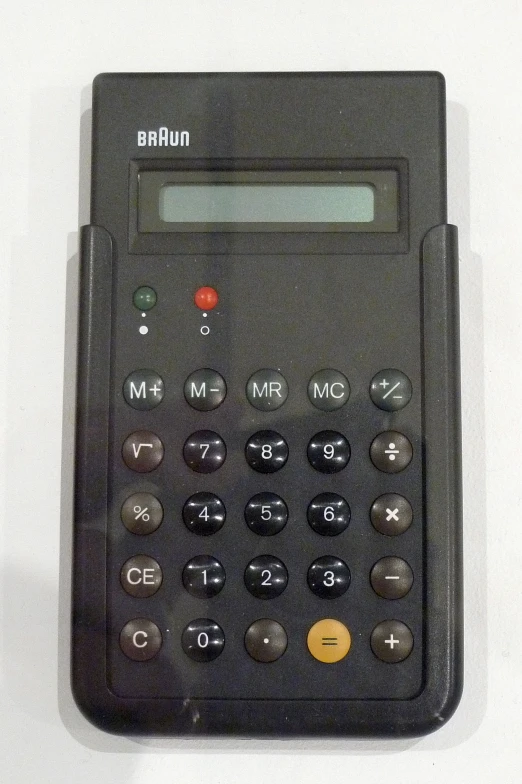 a calculator with a red on in it