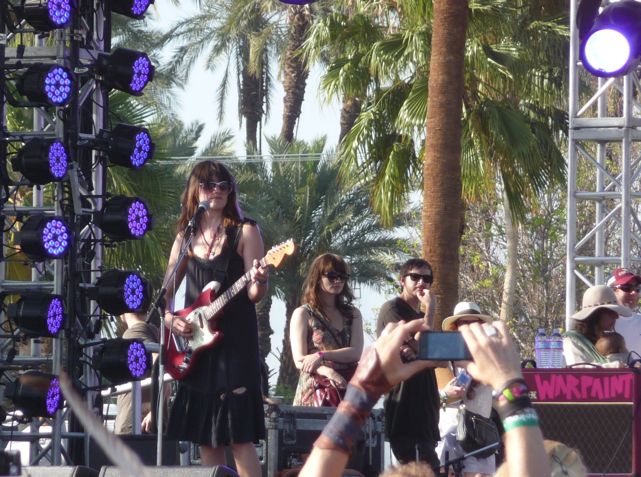 an image of a female singing on stage