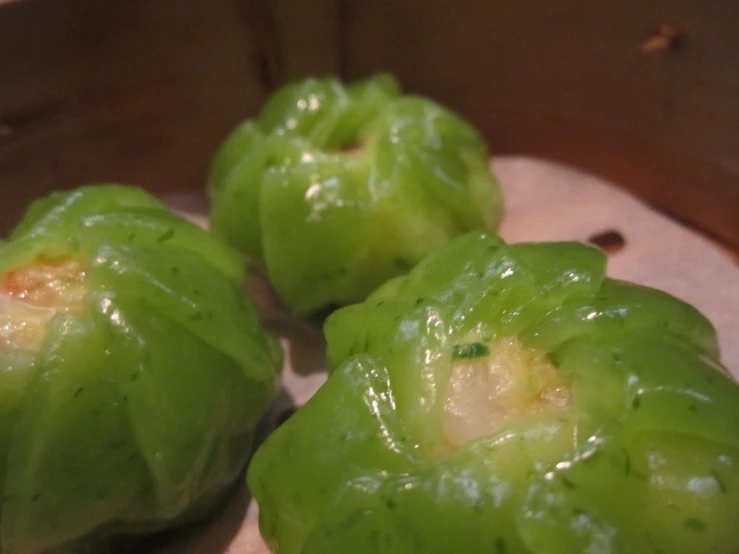 the green peppers are stuffed with the sauce
