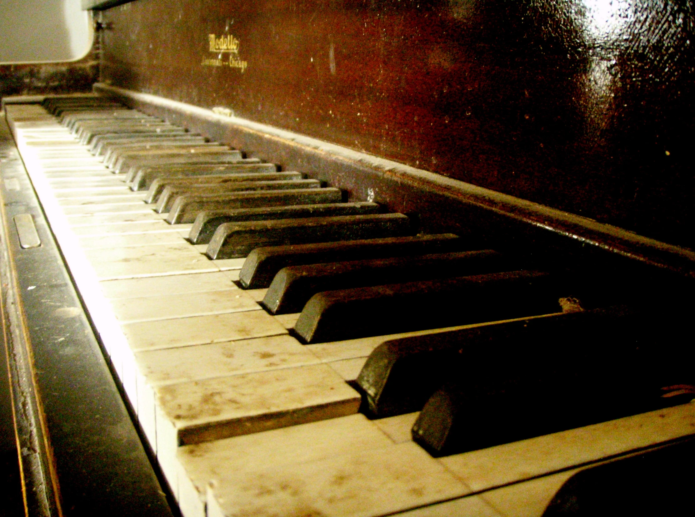 a close up view of an upright piano