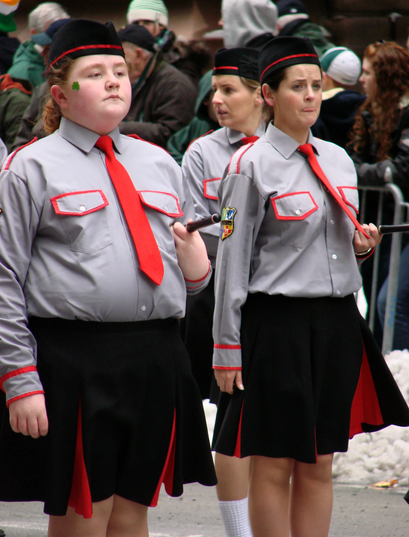 a group of women in uniform standing around