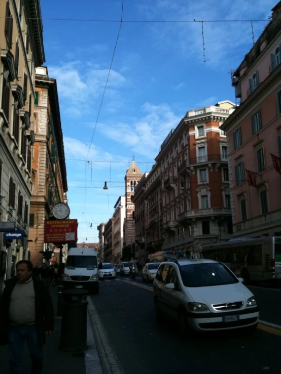 there is a car that is driving down this street