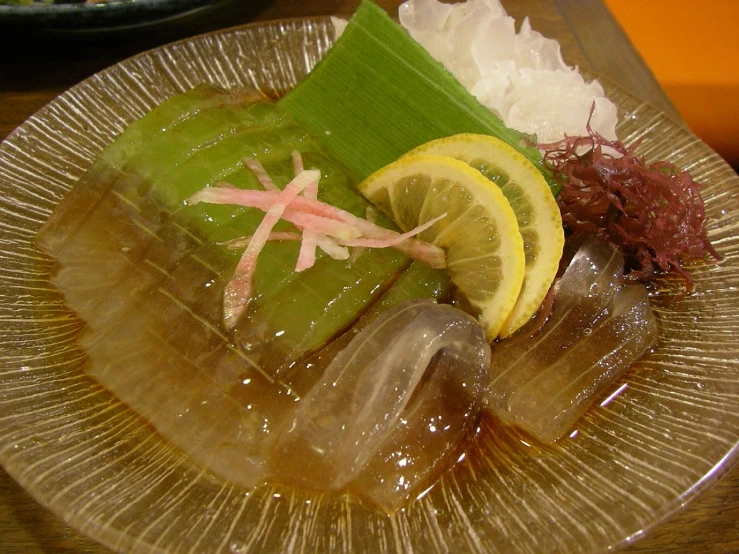 plate of food is placed on table at restaurant