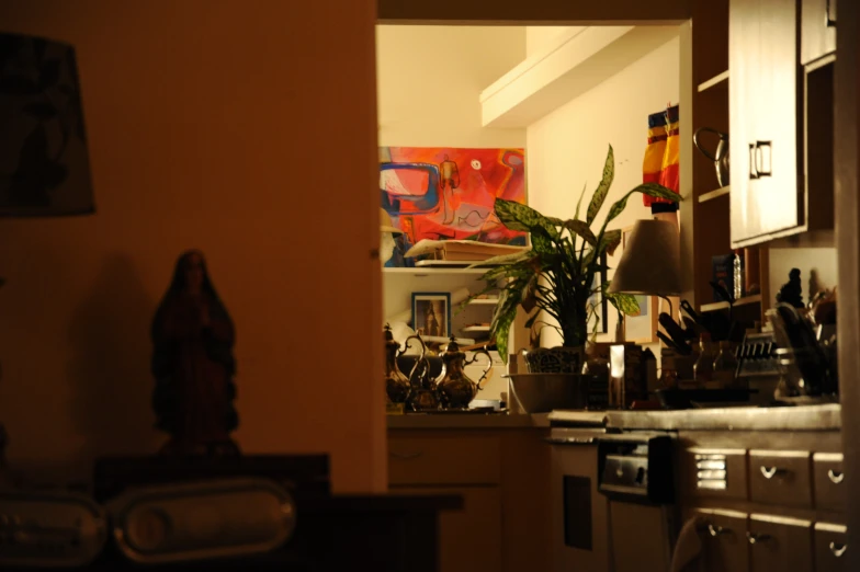 kitchen in dark with view into room