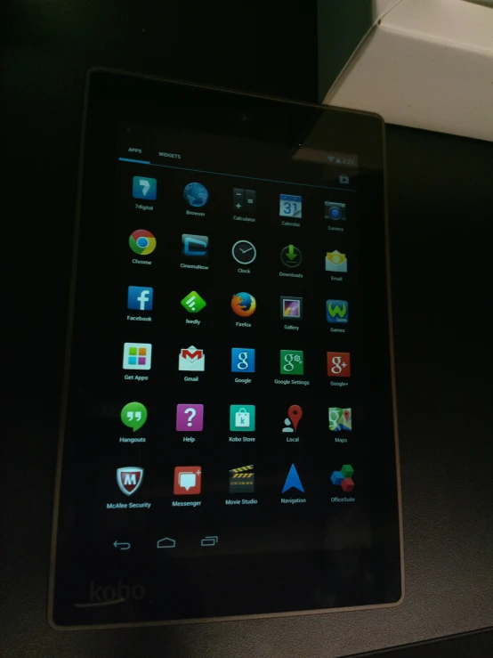 a tablet computer with some small app icons on screen