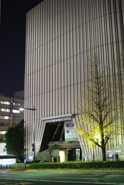 a stop sign in front of a tall building