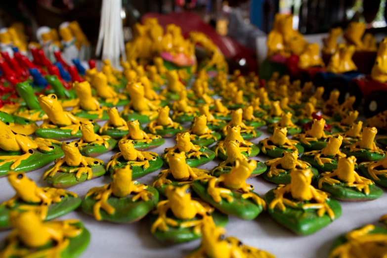a close up of a number of little yellow ducks