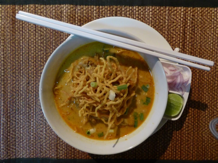 soup with noodles and vegetables on a table