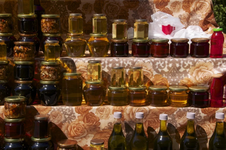 bottles of oils and other ingredients sit on a shelf