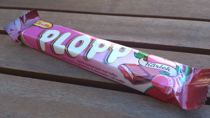 a close up of a candy bar on a bench