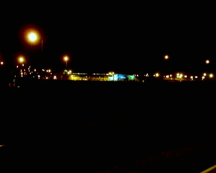 the view from an airport runway at night