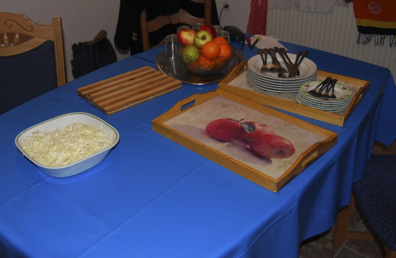 a table set with food on a wooden tray