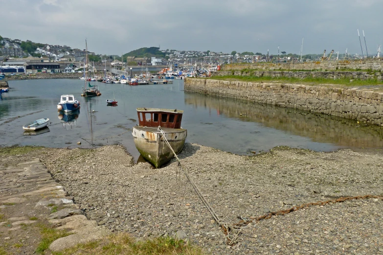 a bunch of boats are floating in the harbor