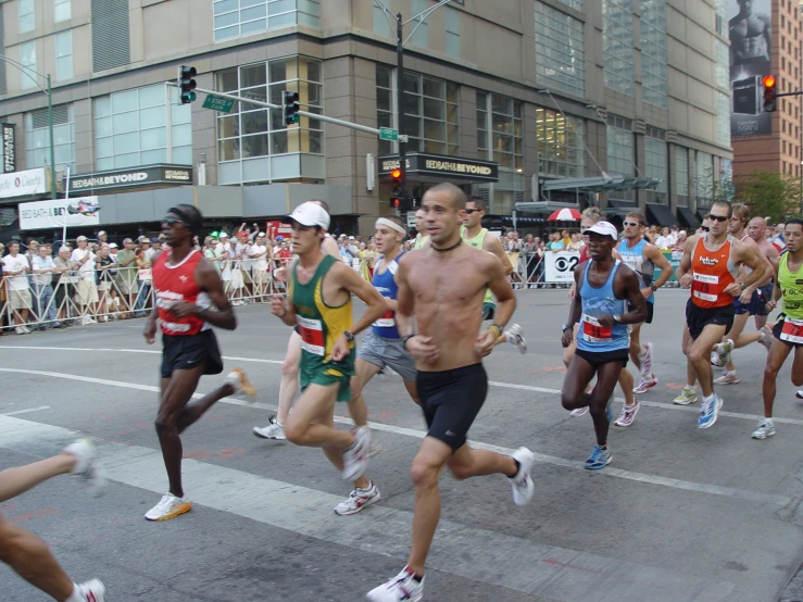 some people running in a street during a marathon