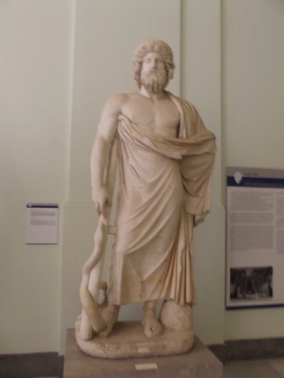 a statue that is in a very big room