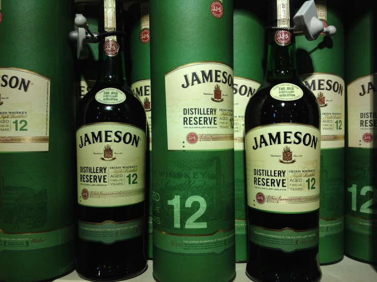 two bottles of jameson sitting next to each other