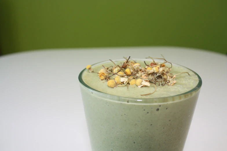 there are dried flowers inside a smoothie