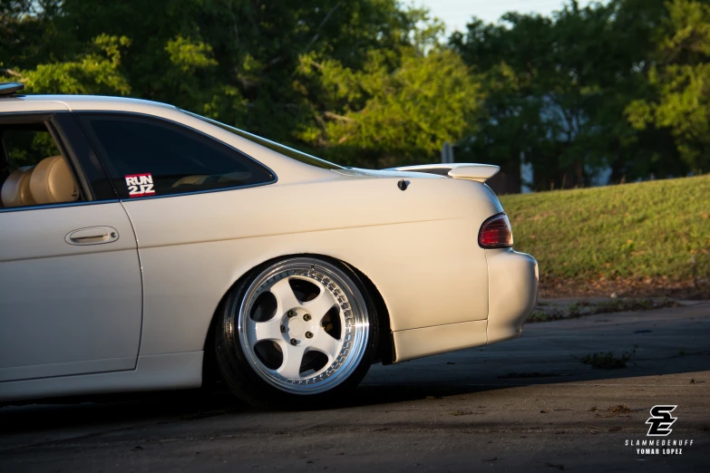 the back of a car is white with black accents