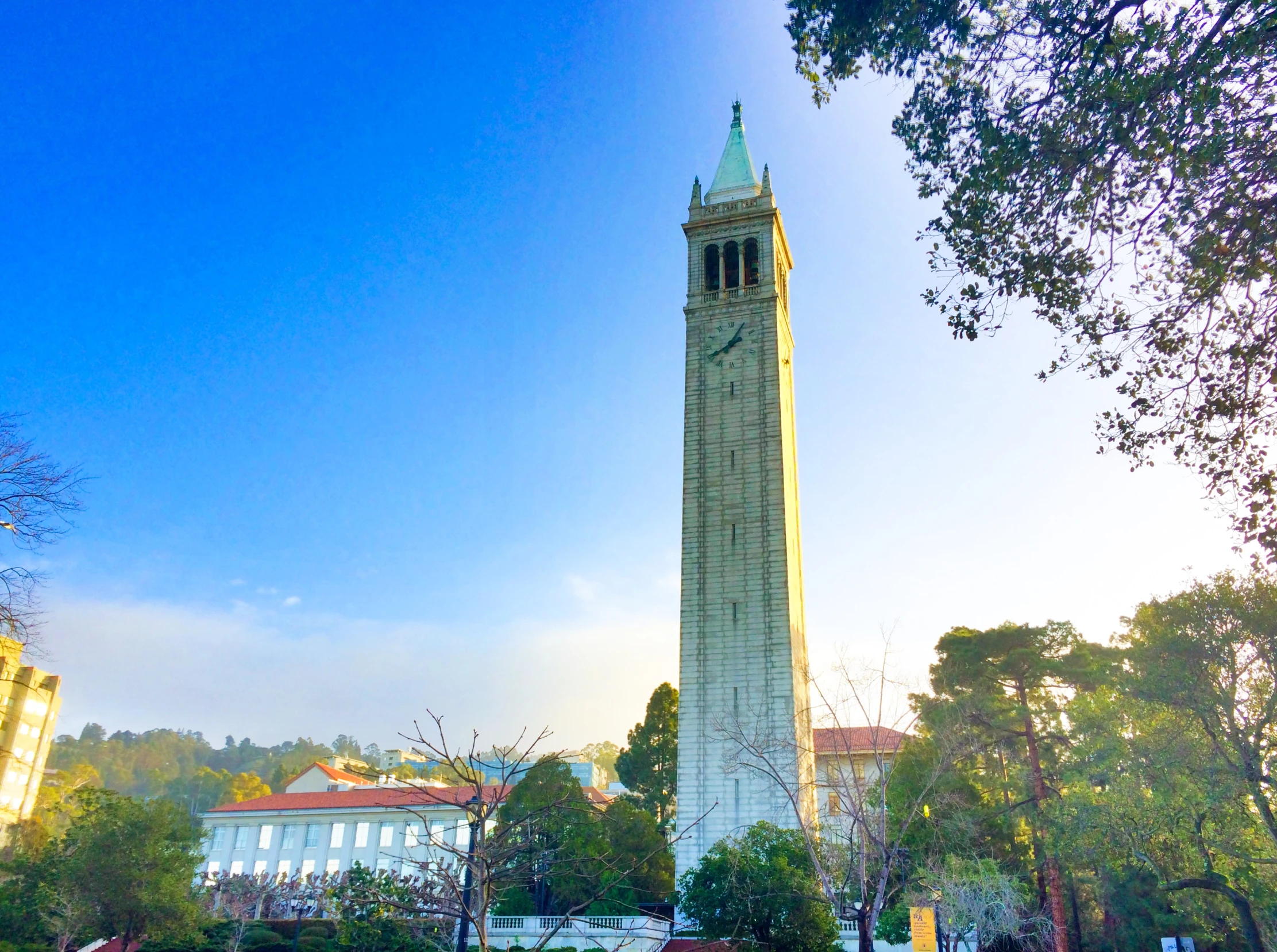 the tower is tall and has two clocks at each side