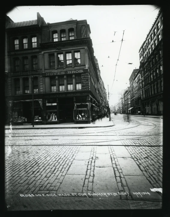 black and white picture of an empty city street