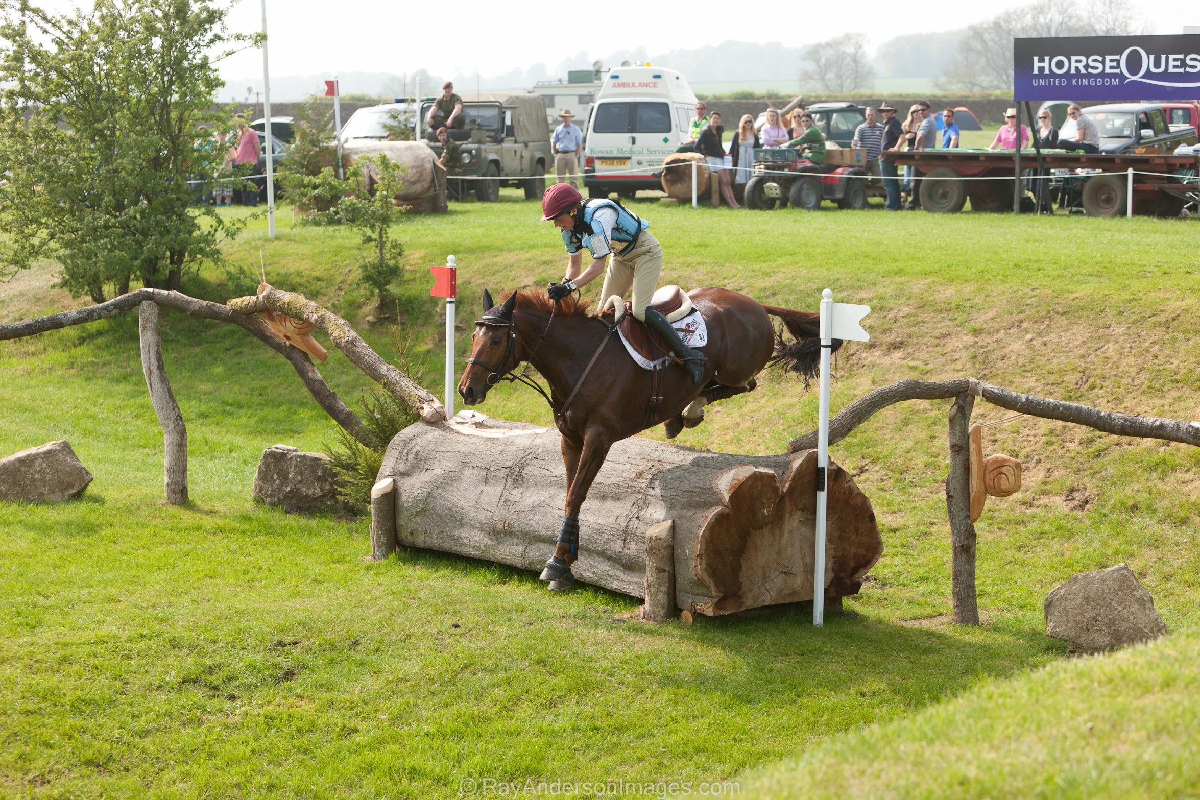 a person that is on a horse on a track