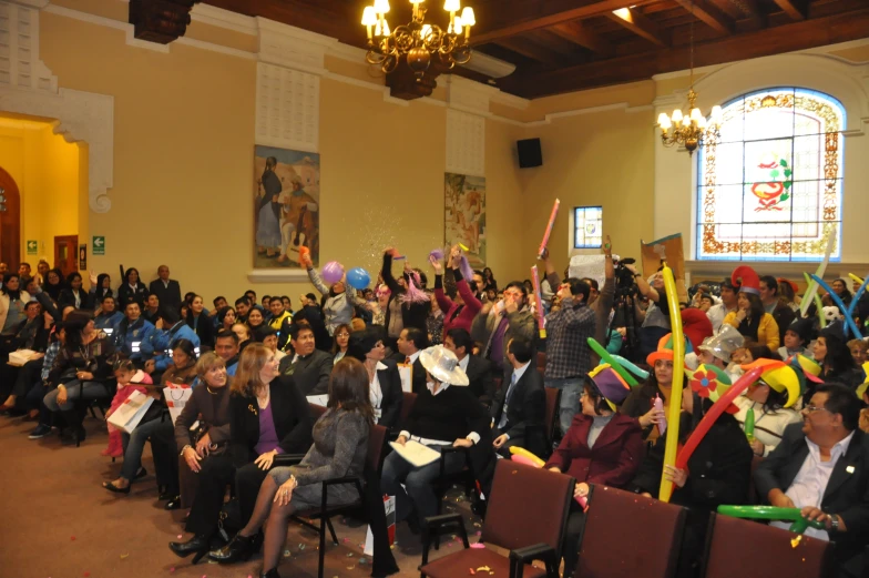 a large group of people in a room