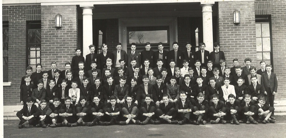 a black and white po of several men in suits