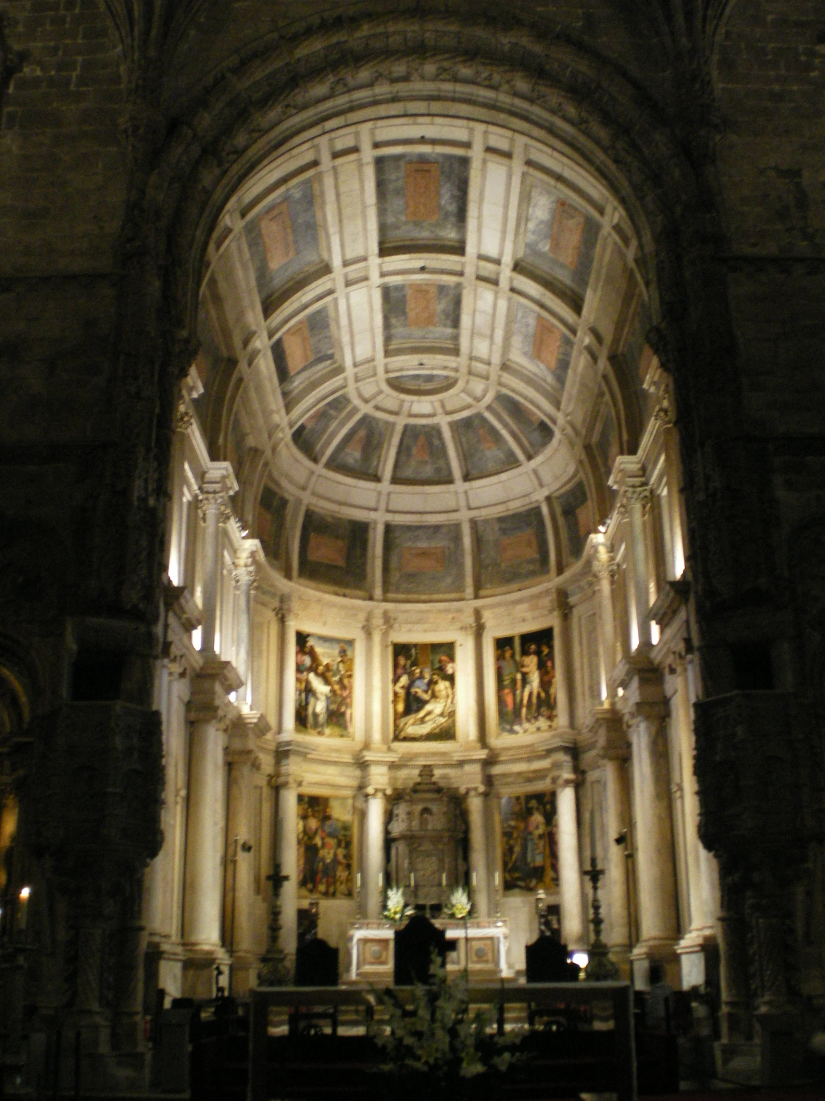 the interior of a catholic church in the sunlight