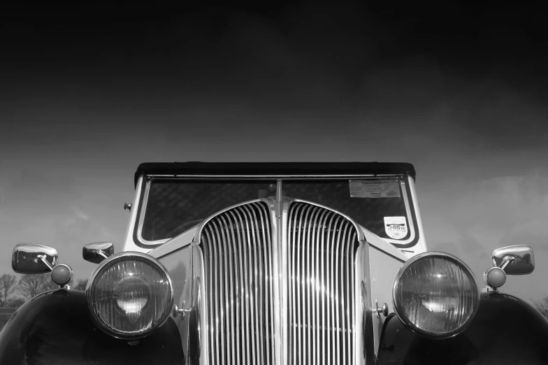 the grille of an old car is very dramatic