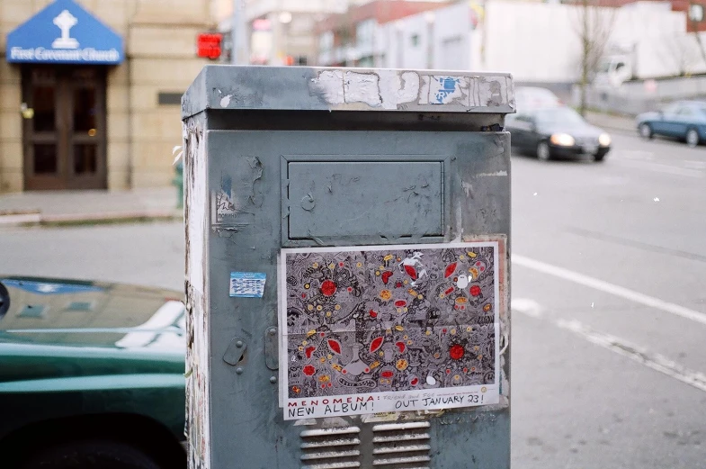 an old style machine in the middle of a city