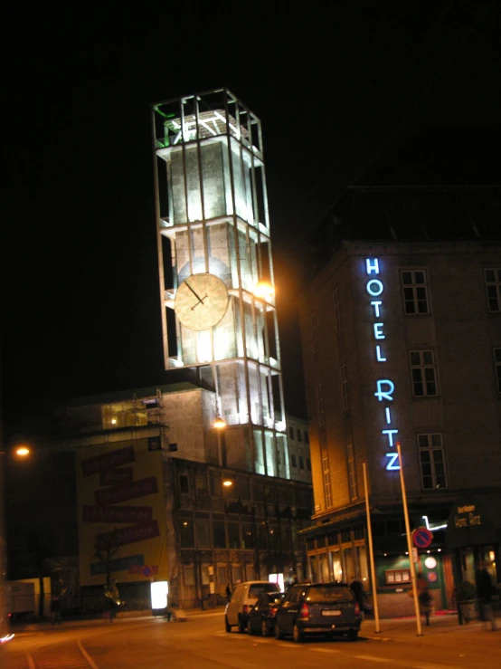 a very tall building with a clock on the side