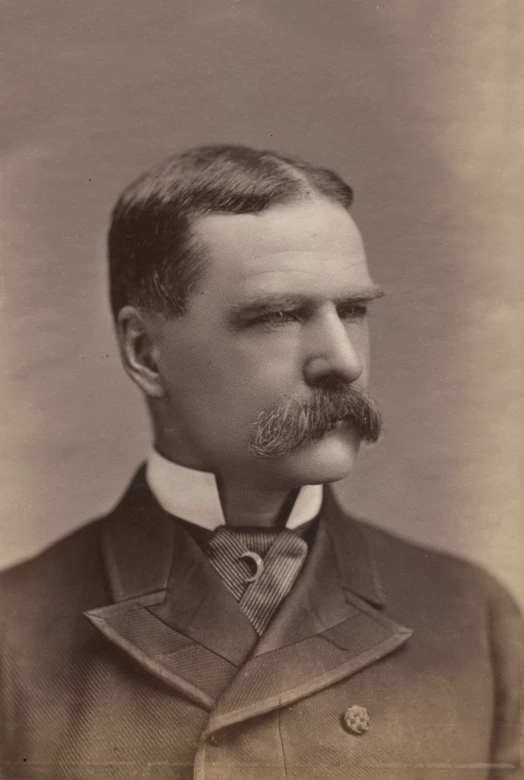 an old - fashioned portrait of a man with a mustache