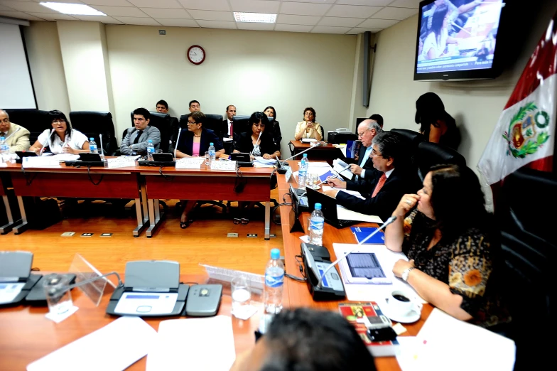 several people sitting around a conference table