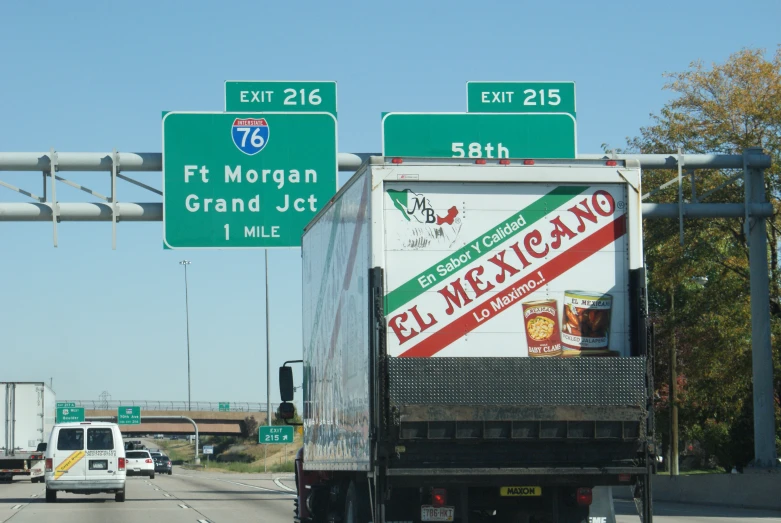 there is an old mexican food truck driving through town