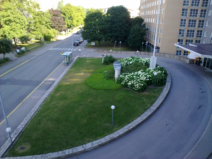 an aerial view of a street near many buildings