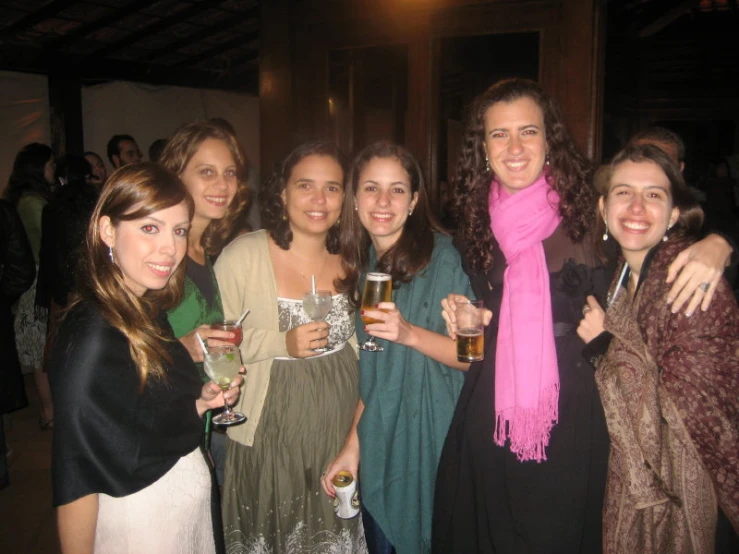 a group of women posing for a po