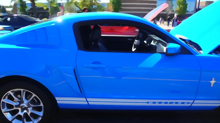 a blue mustang car with a red and white top