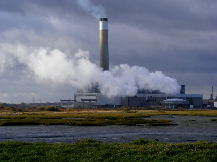 smoke comes out of two large industrial buildings