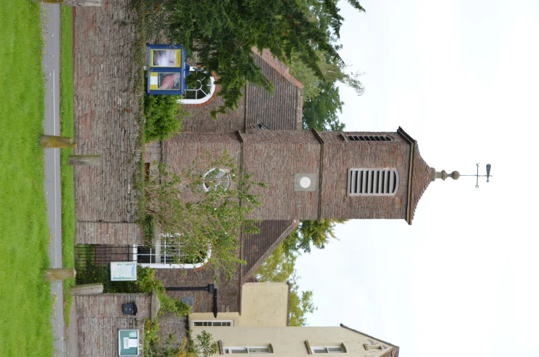 a large old church sitting next to some buildings