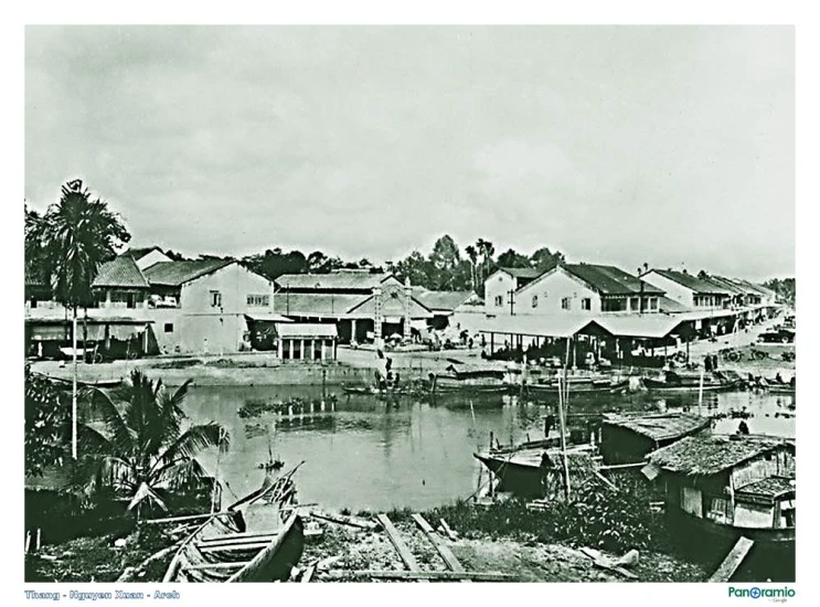 an old black and white po of boats docked at a harbor