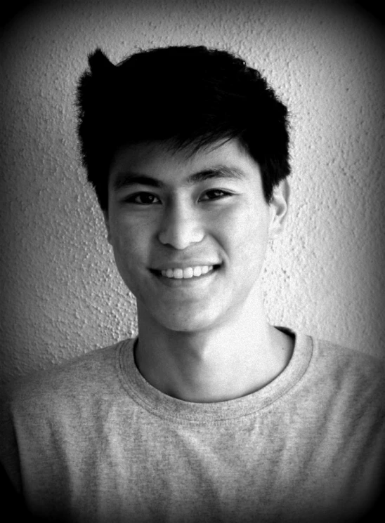 black and white pograph of young asian man