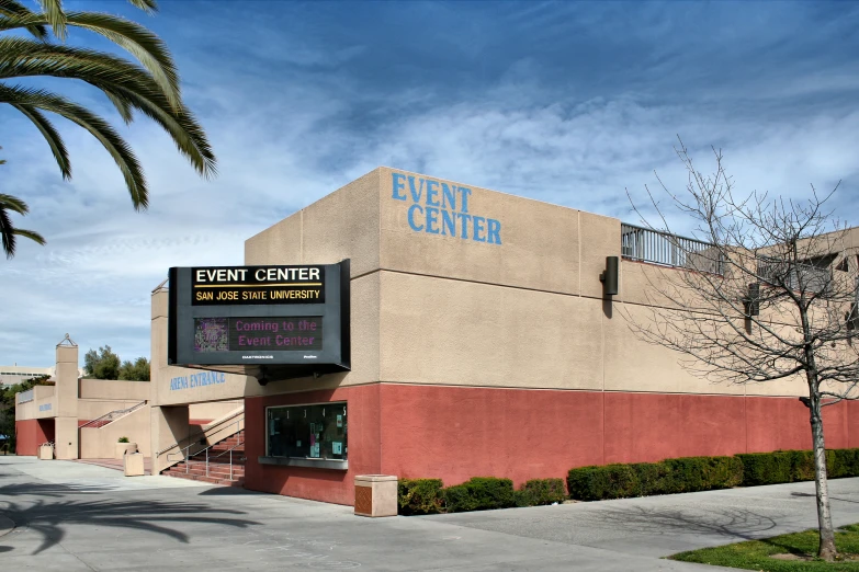 a building with the sign in the front of it