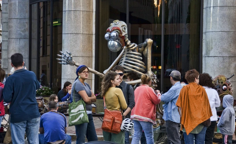 the skeleton is on display outside a crowded store