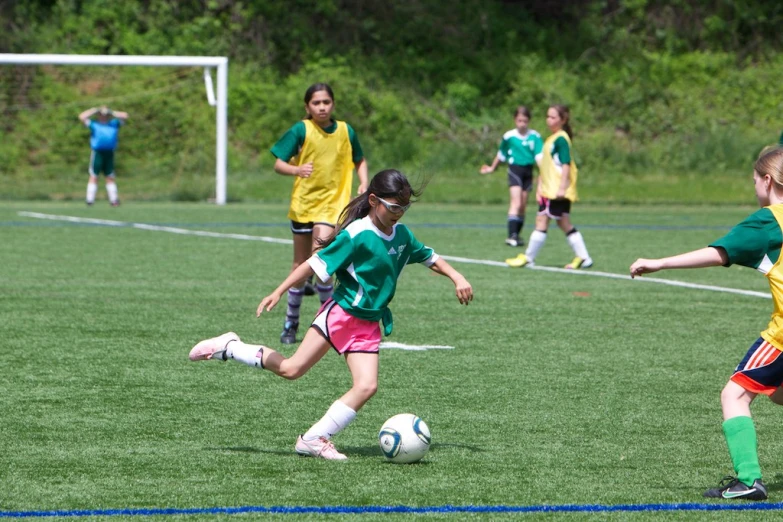 there is a female soccer game going on