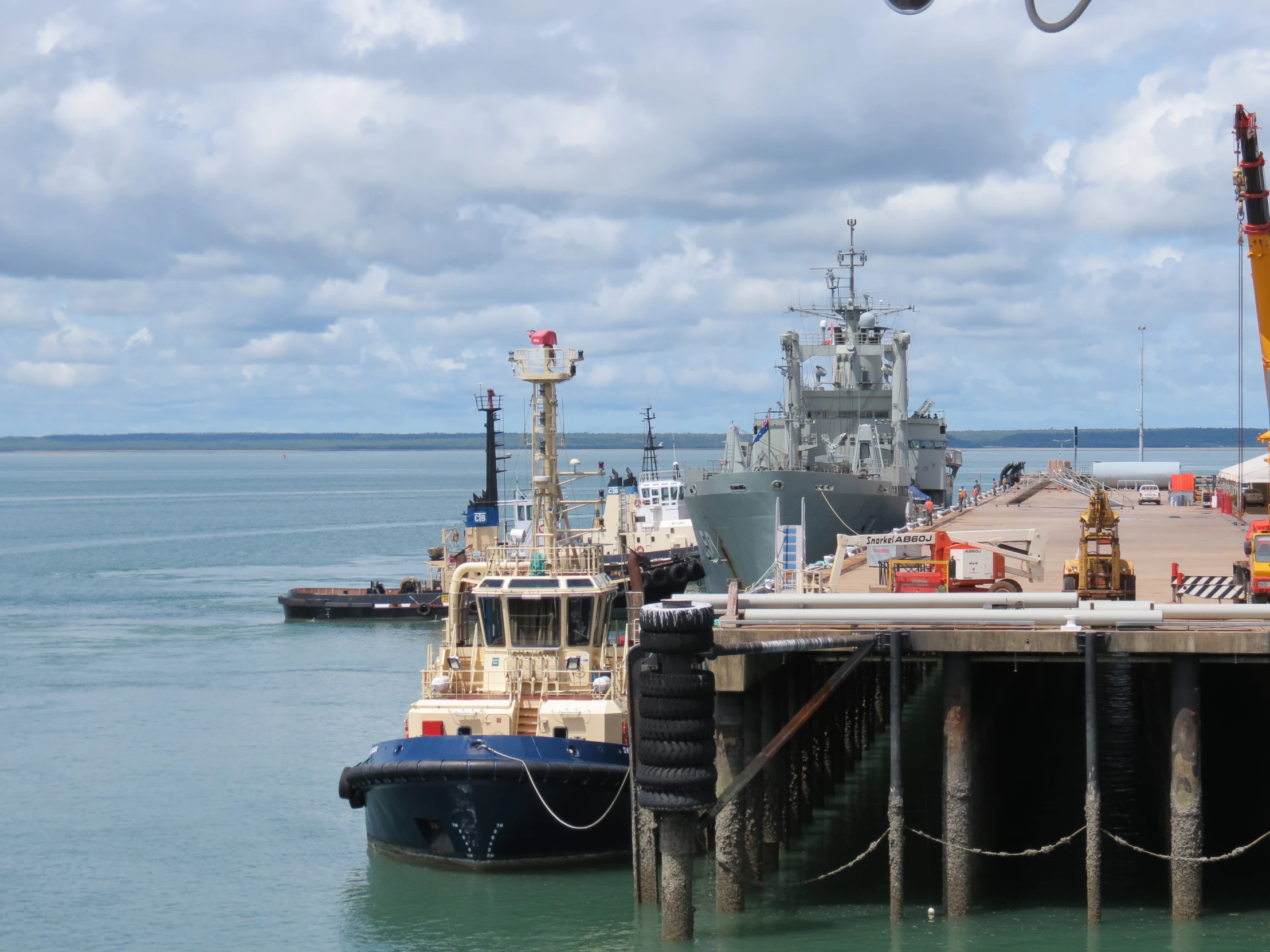 several large ships tied up at the dock