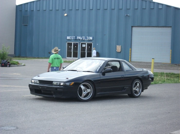 the sports utility car has two doors on it's hood