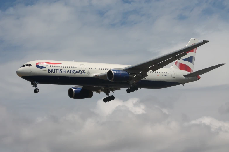 there is a british airways jet airplane flying in the sky