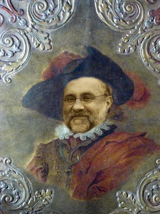 a portrait of a man with a beard and blue bonnet